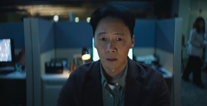 Office worker reviewing data at computer in Anaplan AI Supply Chain Analyst commercial