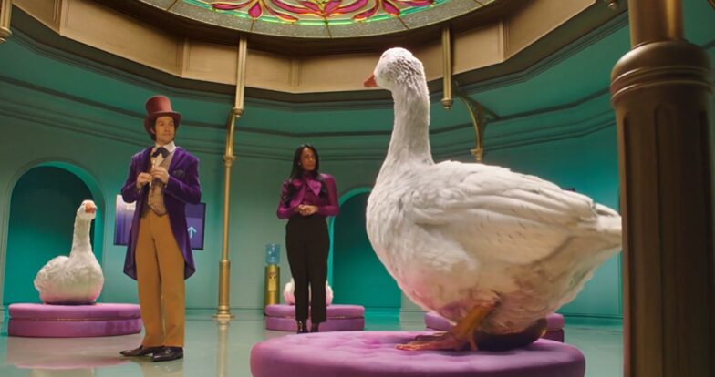 whimsical room with two actors and ducks