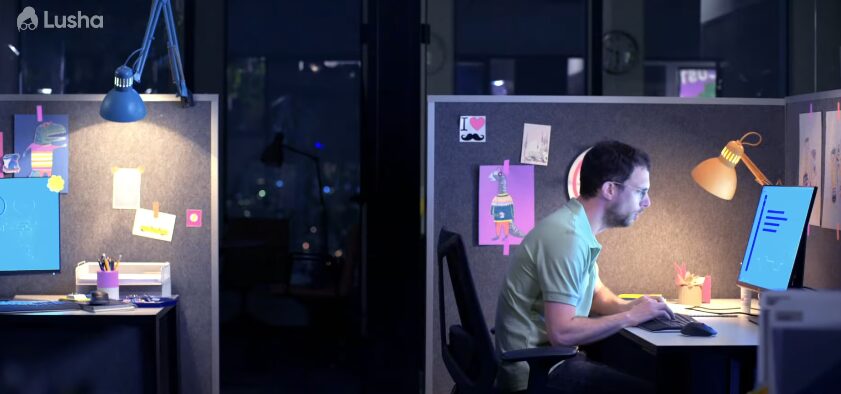 man working late in cubicle for Lusha Commercial