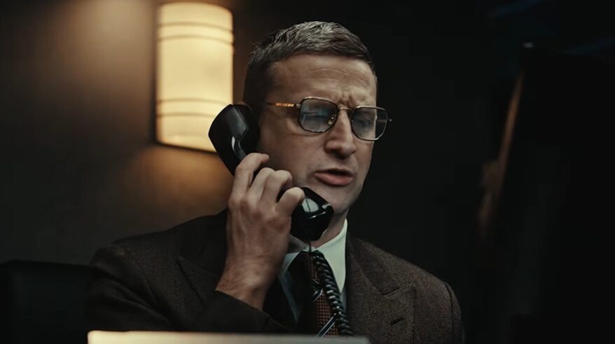 man in an office on the phone for rippling commercial