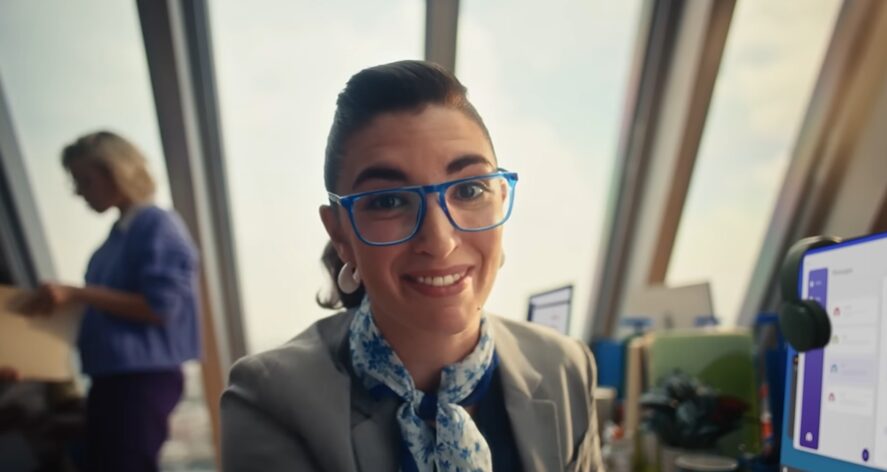 lady sitting in an office for okta commercial