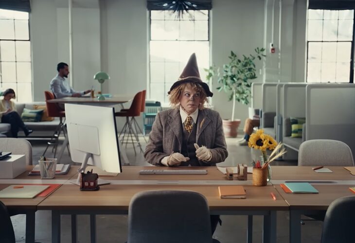 a scarecrow working in an office for Zapier commercial