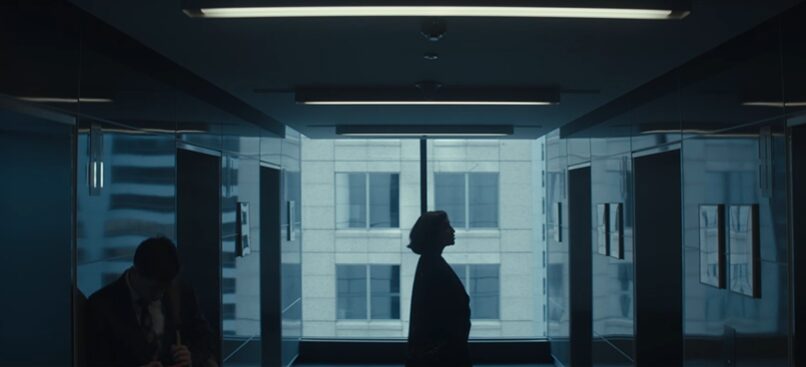 CEO getting into a lift for Upwork commercial