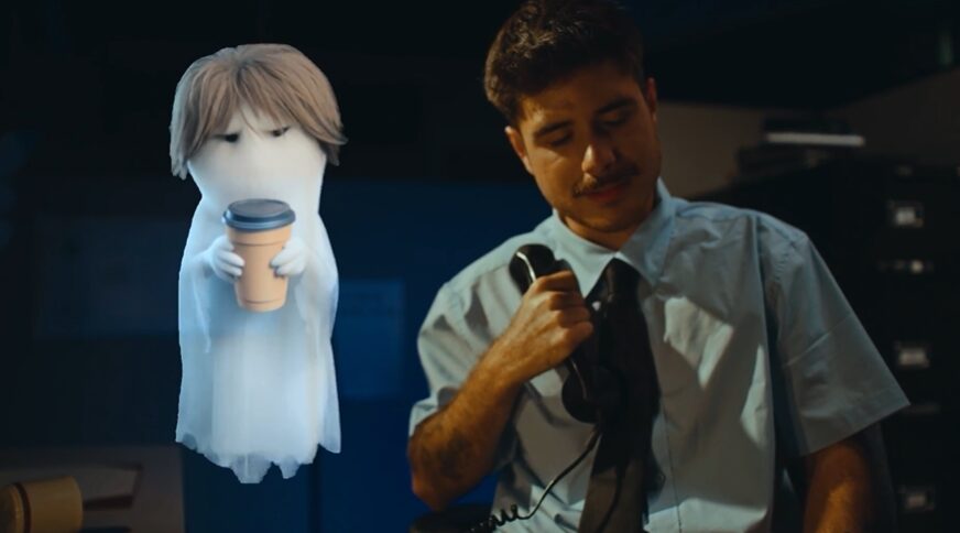 Professional in a dark office with an animated ghost for Aligned commercial