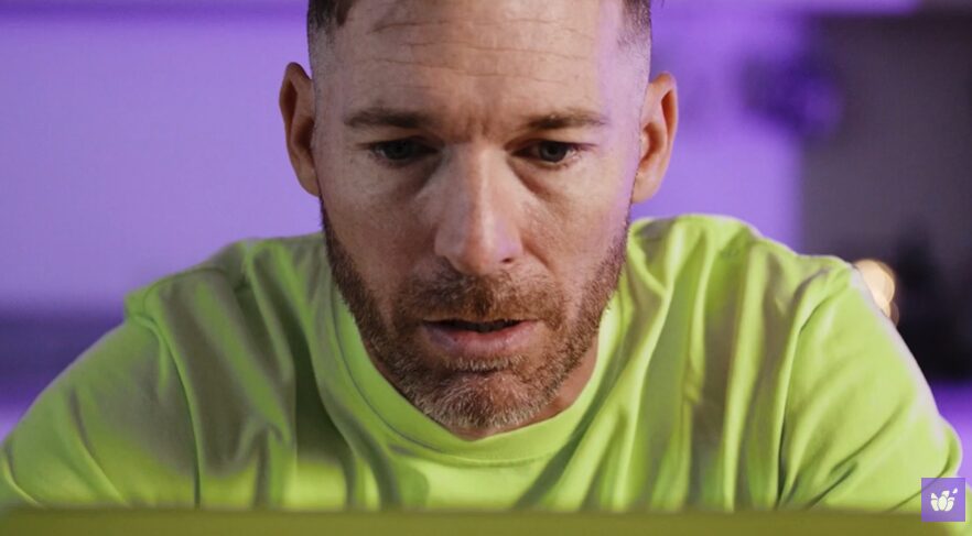 man sitting in front of laptop for Lavender commercial