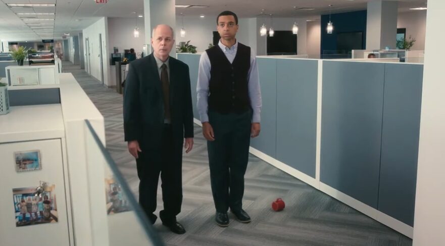 Two professionals walking through an office for Workday commercial
