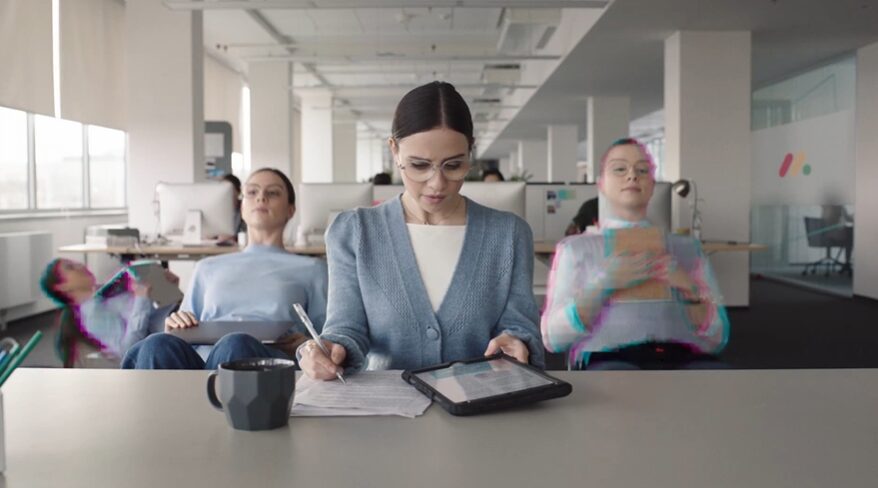 A female professional duplicating herself for Monday.com commercial