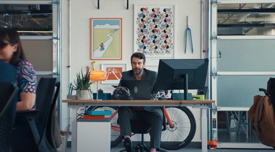 Professional sitting in office for Amazon Business commercial